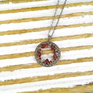 Macy's garnet and marcasite pendant w/ 18" chain in sterling silver. NWOT